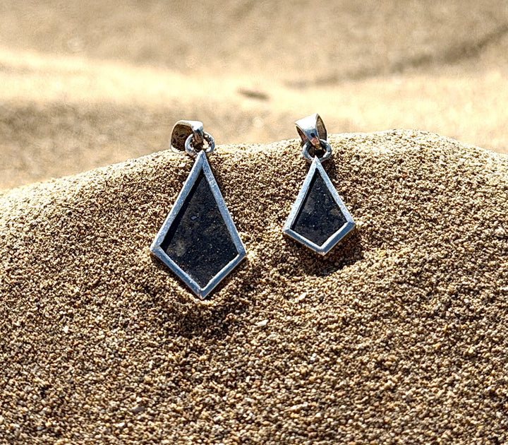 Classic and Grand pendants side by side for size comparison