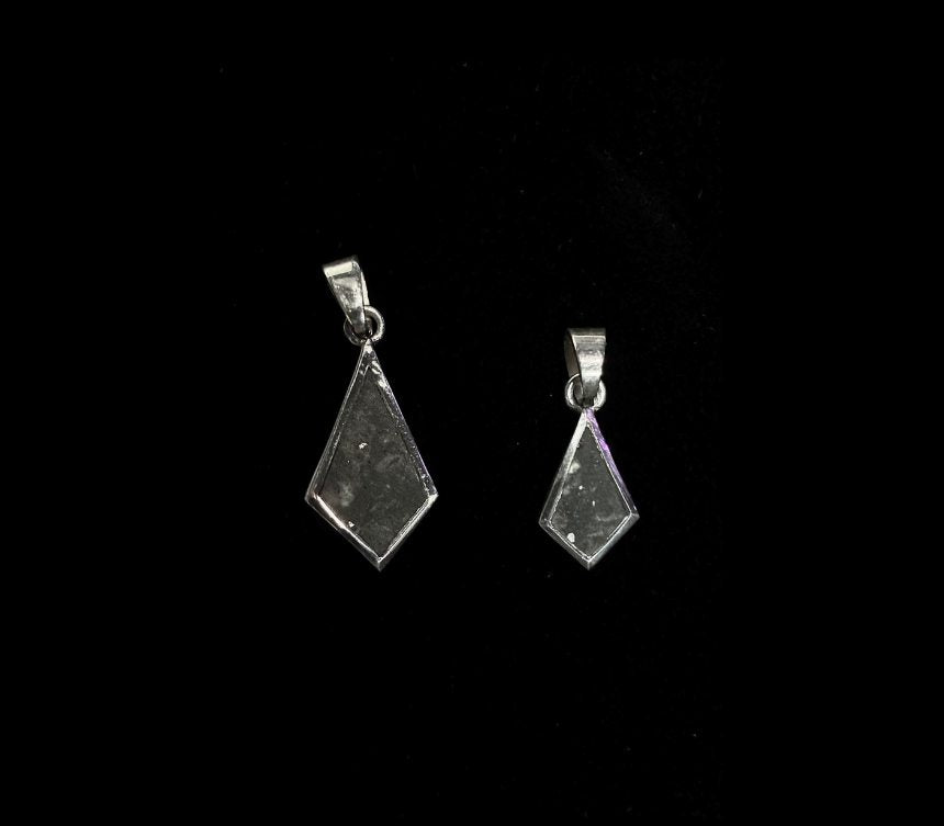 Classic and Grand pendants side by side for size comparison